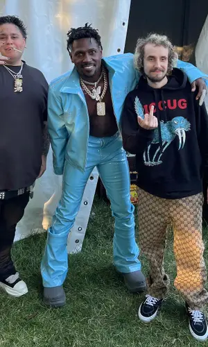 Pouya wearing Gucci pants