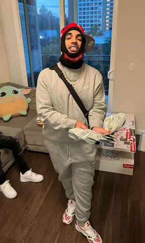 Fenix Flexin wearing New Era cap
