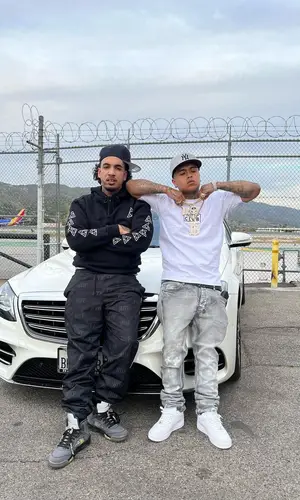 Fenix Flexin wearing Fuck The Population pants