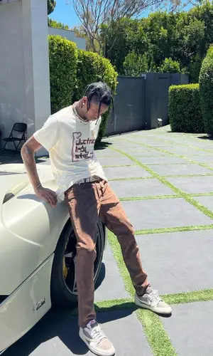Travis Scott wearing Nike sneakers