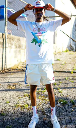 Coldheartedsavage wearing Casablanca shorts