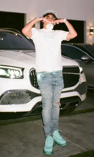 OhGeesy wearing Balenciaga sneakers