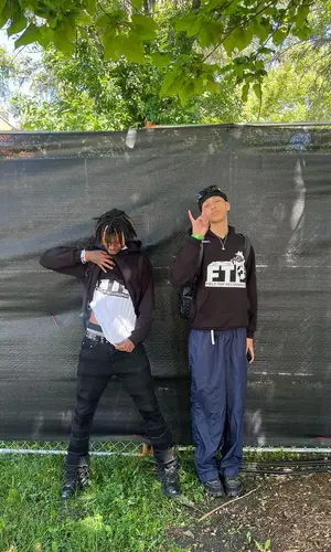 Slump6s’ Outfit in Prada Sneakers, Louis Vuitton Backpack & Versace Eyewear (2022)