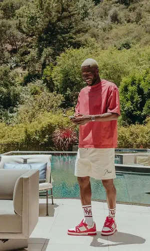 Fikayo Tomori wearing Rhude shorts