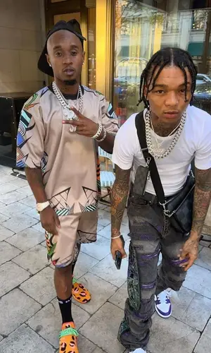 Swae Lee wearing Louis Vuitton bag