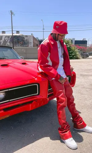 Tyga’s Outfit in Nike Sneakers, Tom Ford Eyewear & Prada Hat (2022)