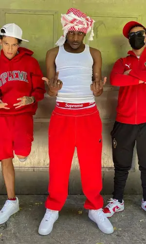 Central Cee wearing Supreme cap