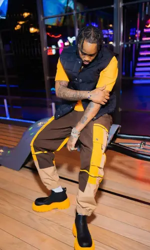 Fivio Foreign wearing Bottega Veneta boots