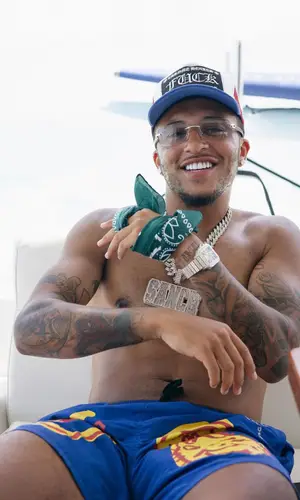 Jadon Sancho wearing Travis Scott Merch shorts