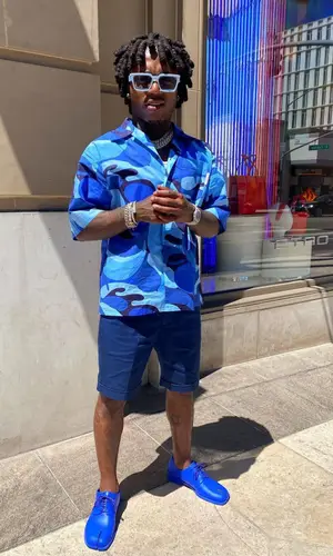 Jacquees wearing Maison Margiela boots