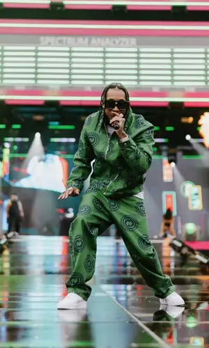 Tyga’s Outfit in Arte Antwerp Jacket, Nike Sneakers & Louis Vuitton Eyewear (2022)