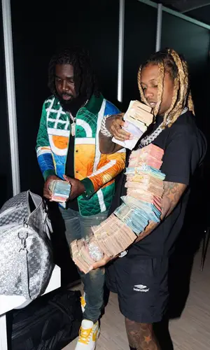 Lil Durk wearing Balenciaga shorts