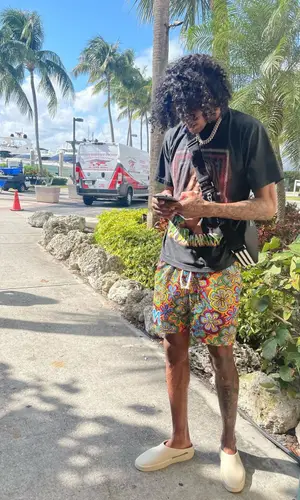 Jalen Green wearing Prada bag