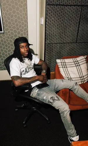 Polo G wearing Gallery Dept. cap