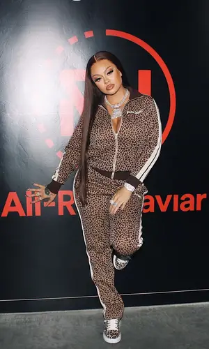 Latto wearing Palm Angels jacket