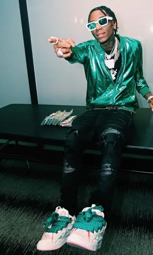 Soulja Boy wearing Burberry belt