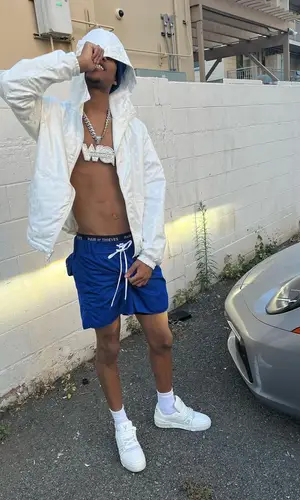 Nardo Wick wearing Louis Vuitton shorts