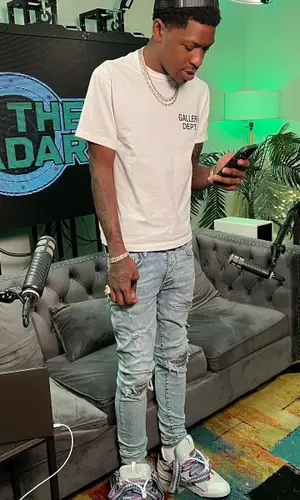 Ceo Trayle wearing Lanvin sneakers