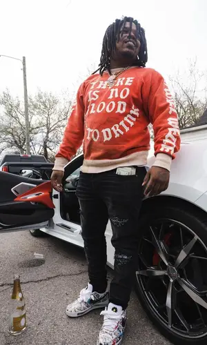 Wb Nutty wearing Nike sneakers