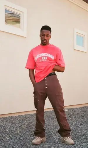 Giveon wearing Balenciaga t-shirt
