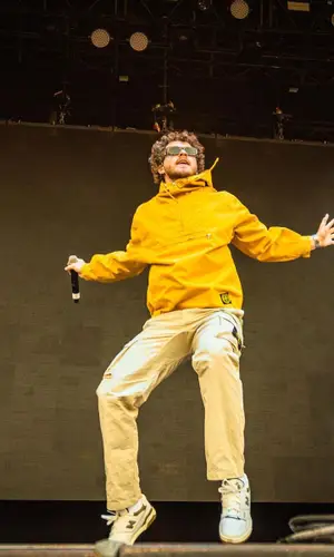 Jack Harlow’s Outfit in Stone Island Jacket, New Balance Sneakers & Versace Eyewear (2022)