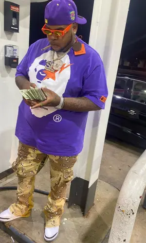 Big Yavo’s Outfit in Bape T-Shirt, Gucci Eyewear & Heron Preston (2022)