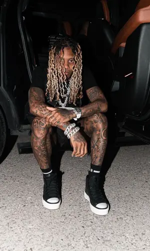 Lil Durk wearing Off-White swimwear