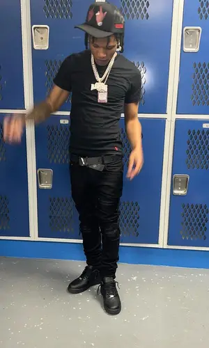 B Lovee wearing Polo Ralph Lauren t-shirt