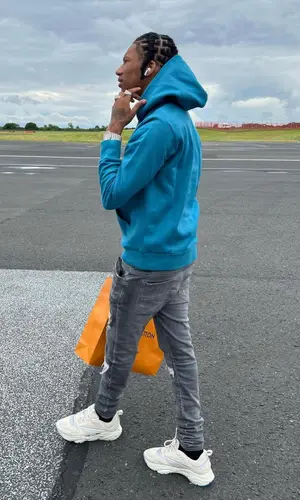 Digga D’s Outfit in Moncler Jacket, Louis Vuitton Hoodie & Amiri Jeans (2022)
