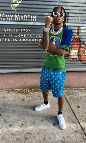 Rich The Kid wearing Marni shorts