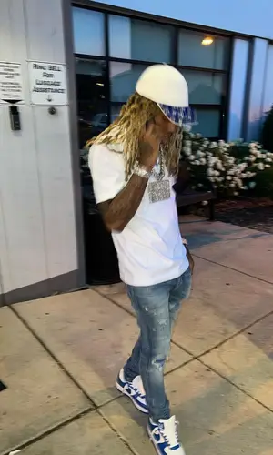 Lil Durk wearing Louis Vuitton cap
