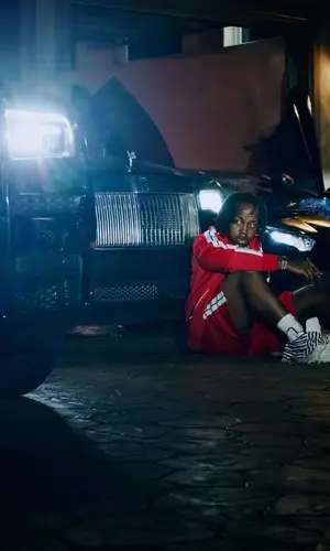 EST Gee wearing Palm Angels shorts