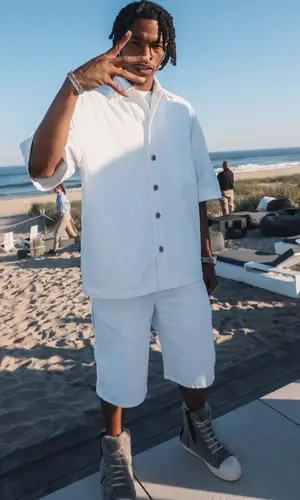 Lil Baby wearing Bottega Veneta shirt