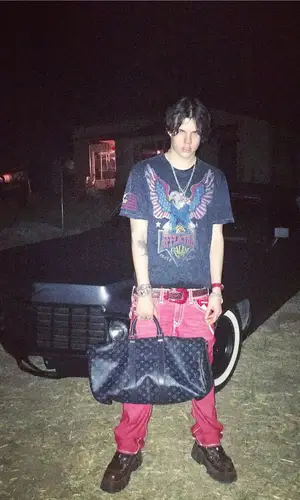 Sematary’s Outfit in True Religion Jeans, B.B. Simon Belt & Louis Vuitton Bag (2022)