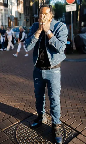 Fivio Foreign wearing Prada belt