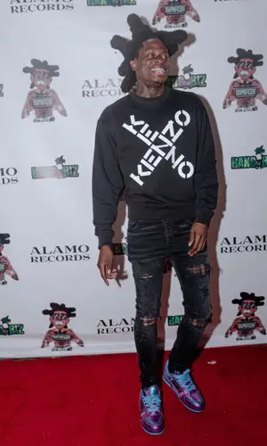 Trapland Pat wearing Amiri jeans
