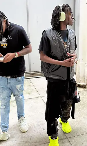 KayCyy’s Outfit in Raf Simons Bag, Apple & Balenciaga Sandals (2022)