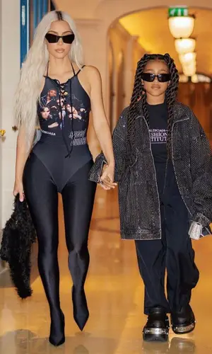 North West wearing Balenciaga sandal