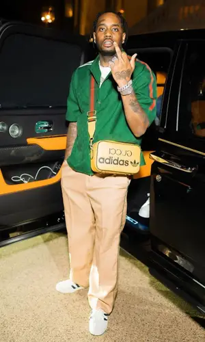 Fivio Foreign wearing Gucci bag