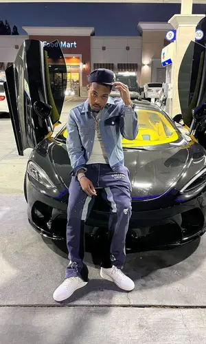 G Herbo wearing New Era cap