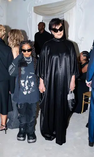 North West wearing Balenciaga sandal
