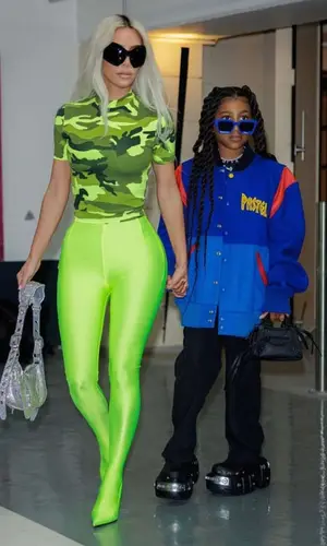 North West wearing Balenciaga sandal