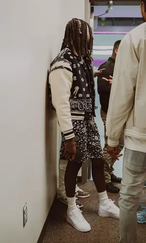 SleazyWorld Go wearing Rhude shorts