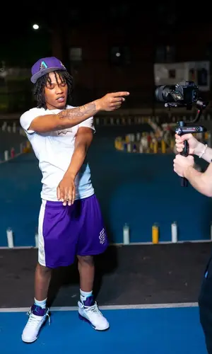 B Lovee’s Outfit in Polo Ralph Lauren T-Shirt, Jordan Sneakers & Nike Socks (2022)
