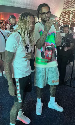 Lil Durk wearing Dolce & Gabbana swimwear