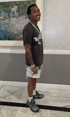 Lil Meech wearing Gallery Dept. shorts