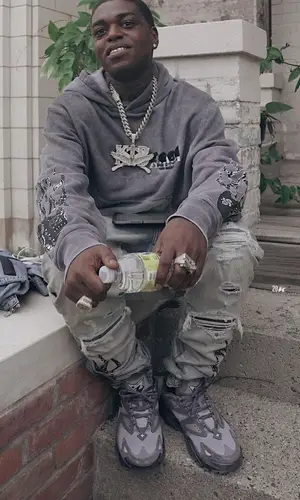 Kodak Black wearing Amiri hoody