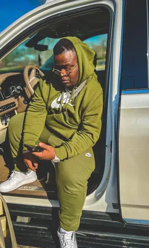 Morray wearing Nike sneakers