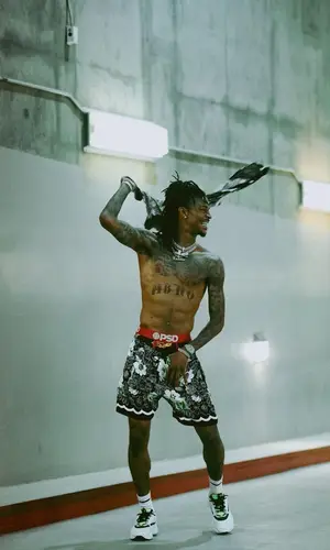 Ja Morant wearing Dior sneakers