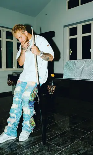 Jake Paul wearing Louis Vuitton bag